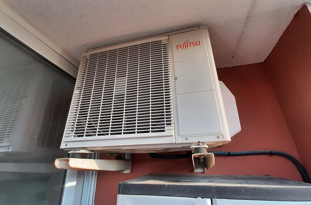 Wall-mounted mini-split AC unit with condensate drain line, Orlando