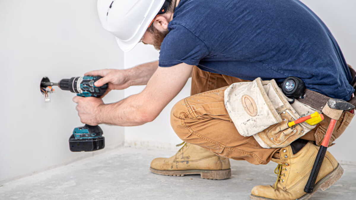 Handyman making repairs in a rental property between tenants in Orlando, FL