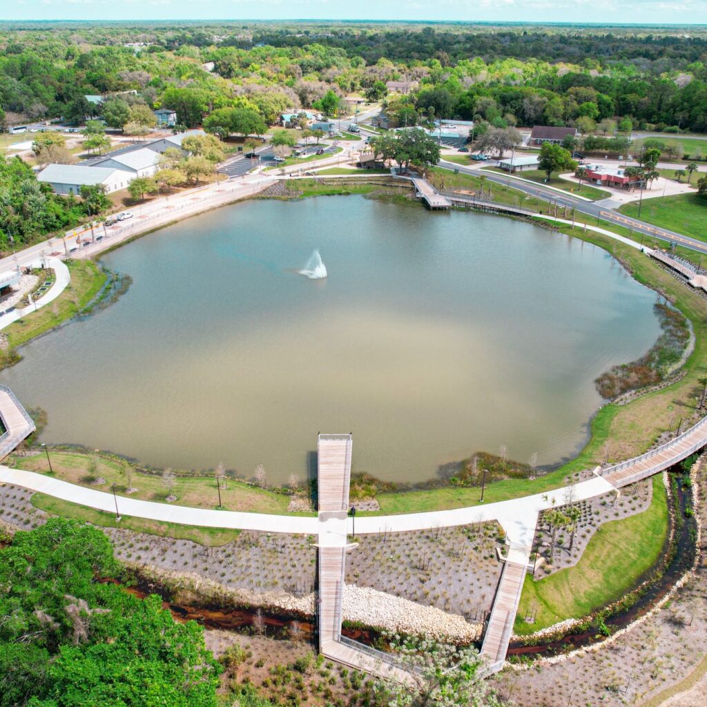 Aerial view of a small park and lake in Oviedo, Florida